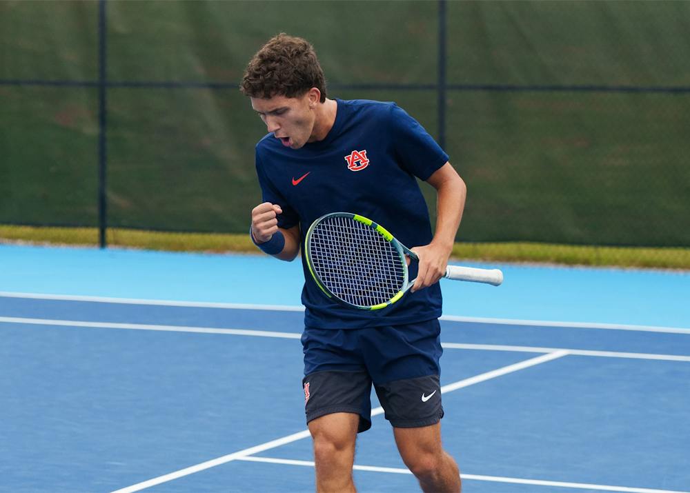 Auburn men’s tennis player Manel Lazaro celebrates a point during the ITA Southern Regional Championships at the Yarbrough Tennis Center in Auburn, Alabama.