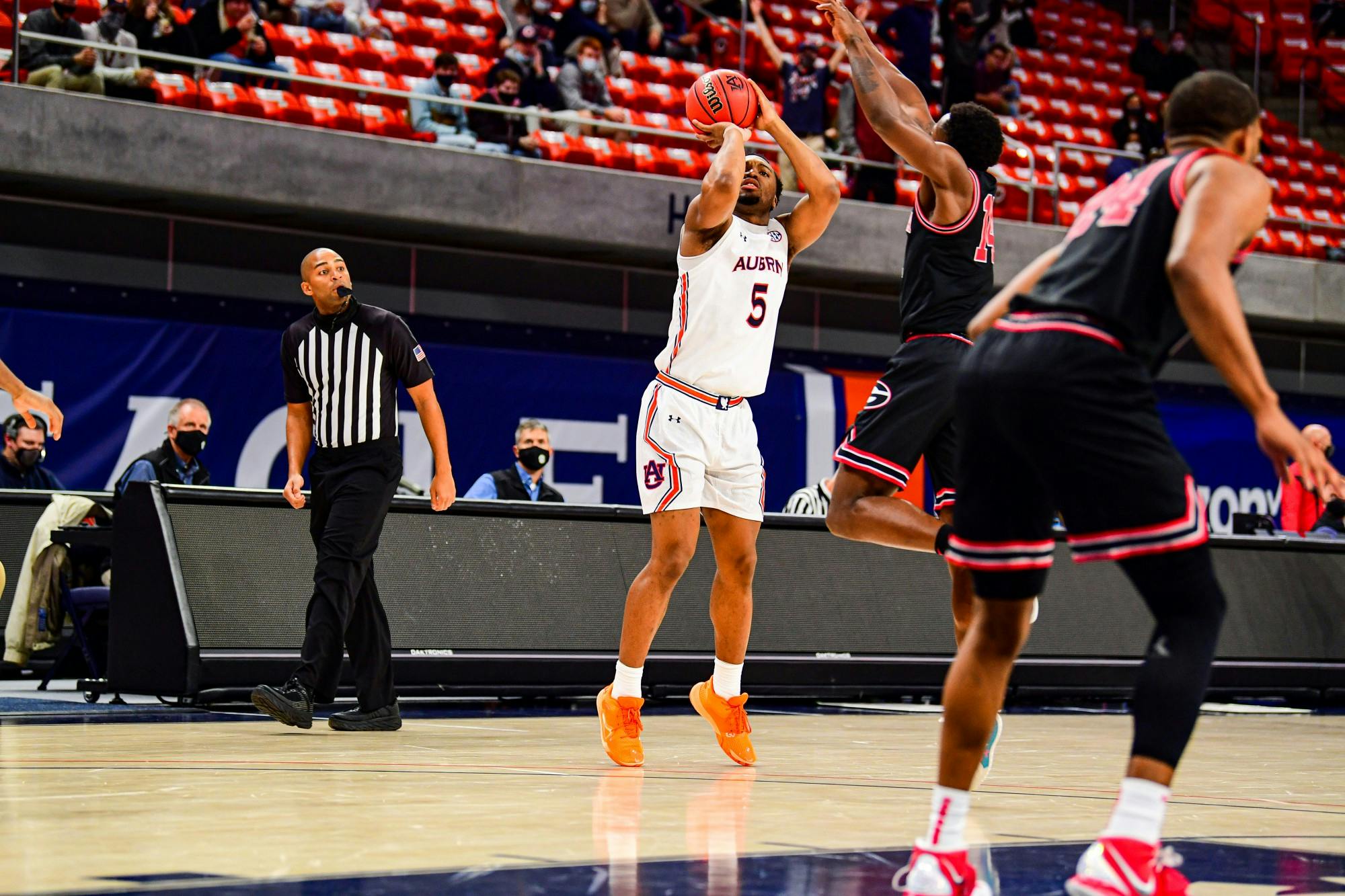  020221_Auburn_SL1_2072_Chris Moore shoots a three.jpg