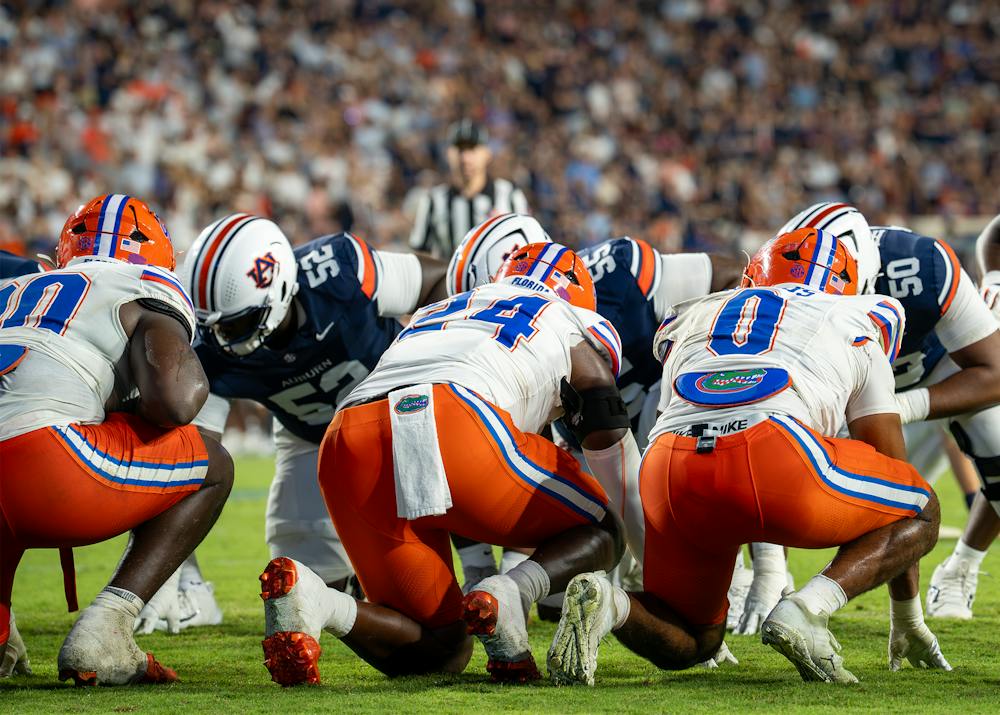 Auburn and Florida football players line up at the line of scrimmage during Auburn’s 44-39 loss to Florida at Jordan-Hare Stadium.