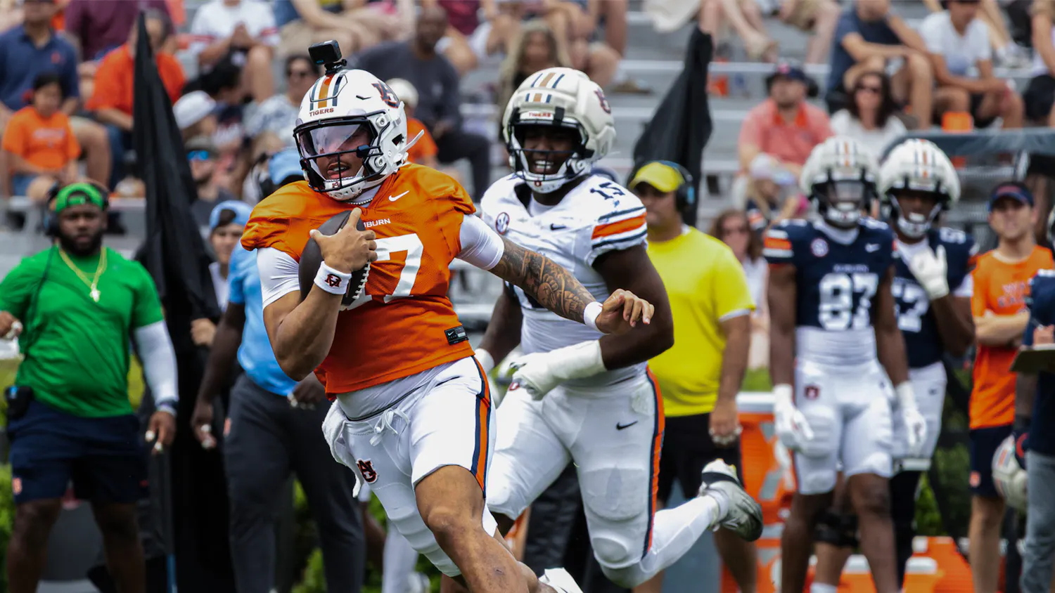 Auburn football quarterback Byrum Brown runs with the ball during A-Day game.