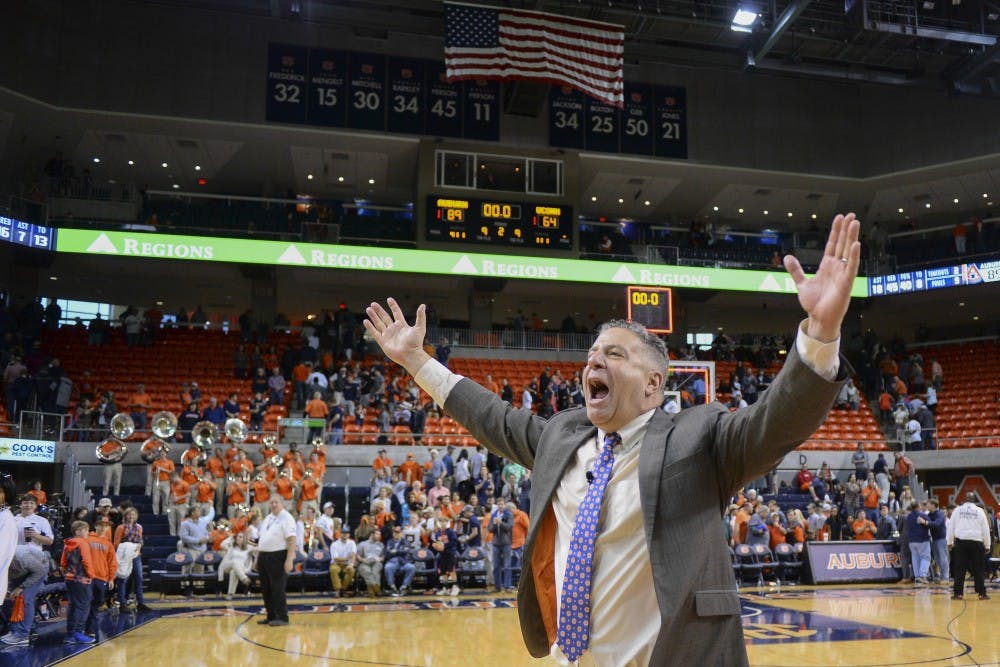 Bruce Pearl celebrates after defeating UConn 89-64. 