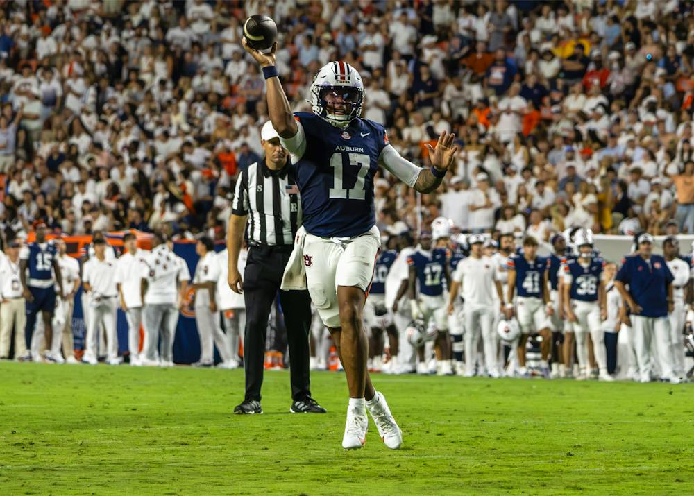 Auburn quarterback Byrum Brown throws a pass during a game at Jordan-Hare Stadium.