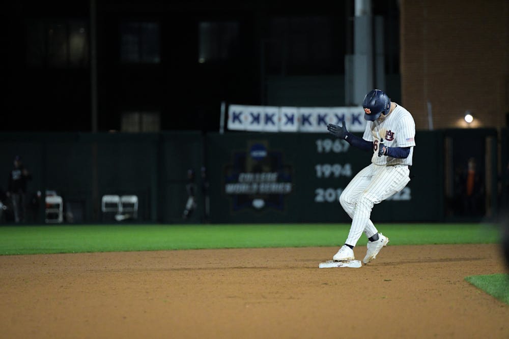 Cooper McMurray (#26) celebrates a double. Photo by Matthew Poczatek | The Auburn Plainsman