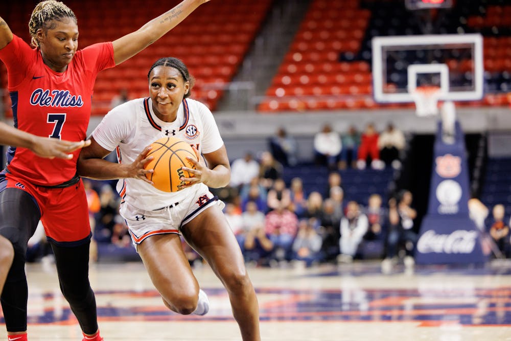 Taylen Collins (14) runs through Ole Miss defense on Jan. 2, 2025.
Photo by Estela Munoz | The Auburn Plainsman