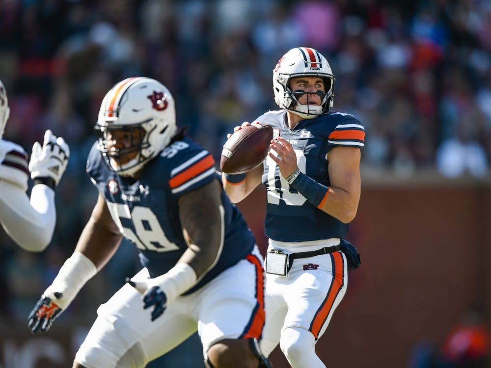 Oct 9, 2021; Auburn, AL, USA; Bo Nix (10) looks for a pass during the game between Auburn and Mississippi State at Jordan-Hare Stadium. Mandatory Credit: Todd Van Emst/AU Athletics