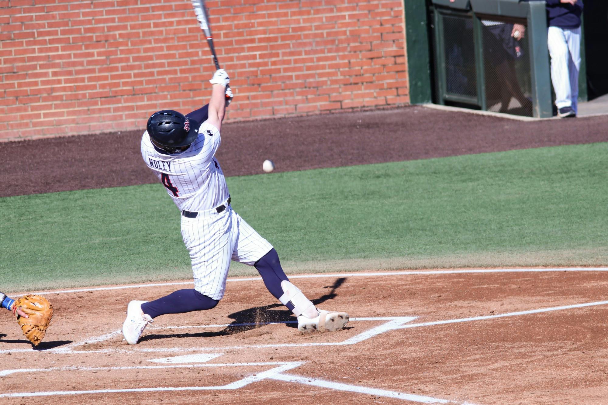 022021_Auburn_IMG_5557_Auburn Tigers infielder Rankin Woley (4) hits the ball .jpg