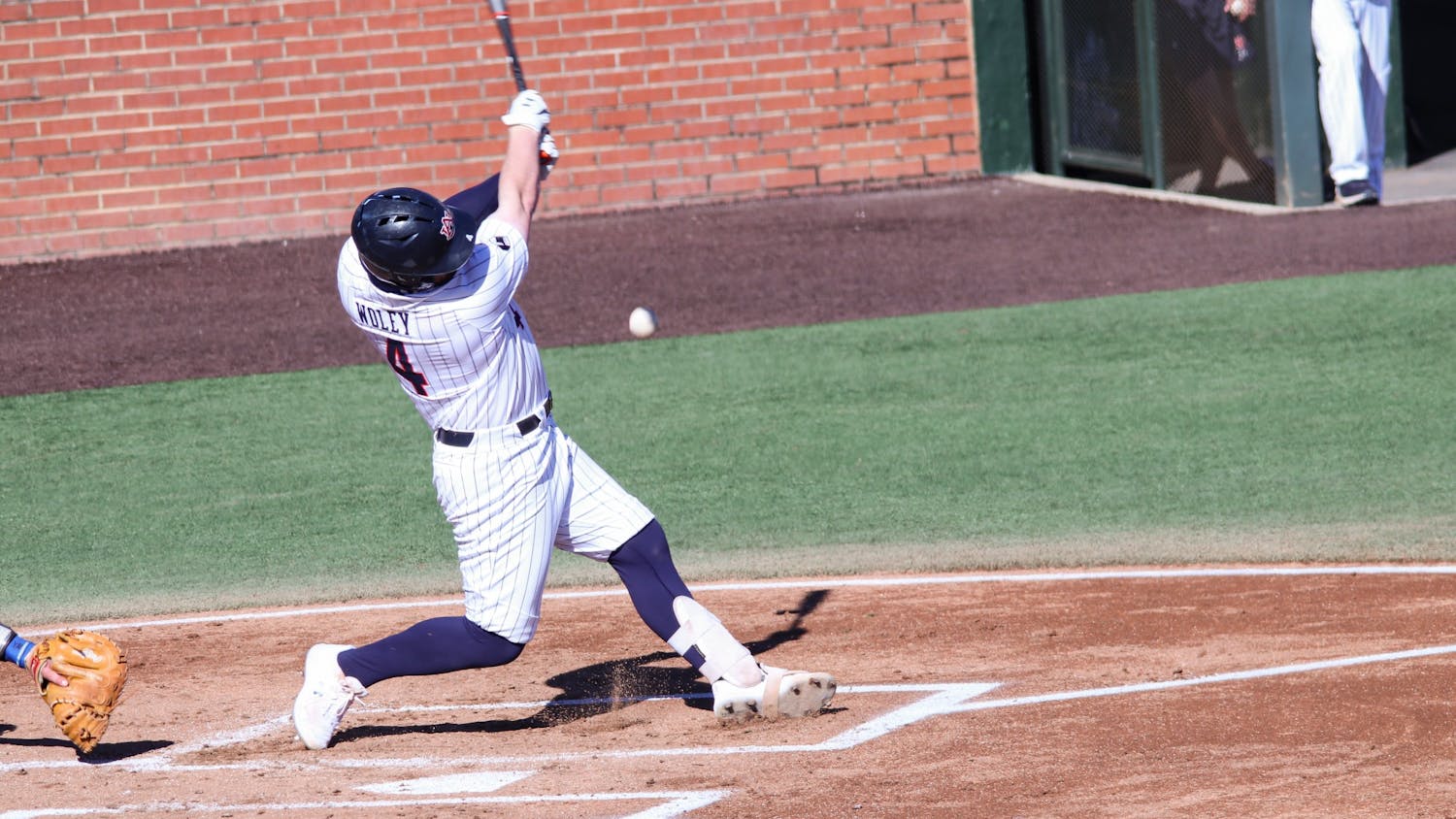 022021_Auburn_IMG_5557_Auburn Tigers infielder Rankin Woley (4) hits the ball .jpg