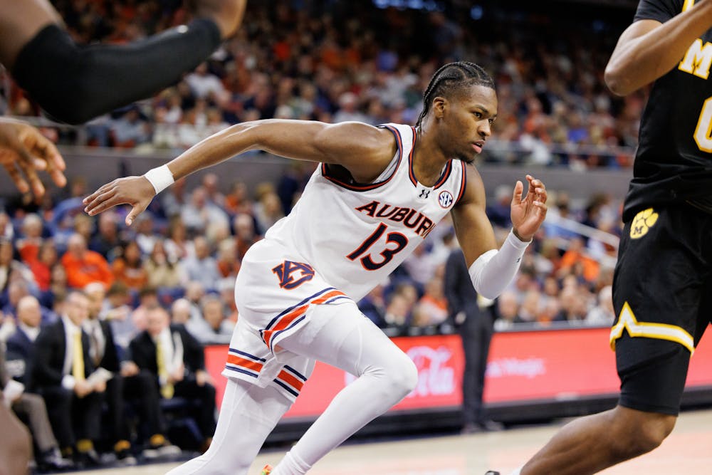 Miles Kelly (13) runs after a Missouri player to defend him on Jan. 4, 2025. Photo by Estela Munoz | The Auburn Plainsman