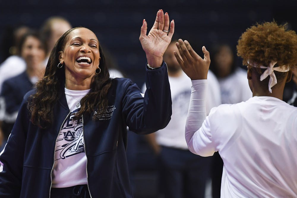 Jan 23, 2020; Auburn, AL, USA; Auburn Tigers head coach Terri Williams-Flournoy greets players during the first half of the game against Ole Miss at Auburn Arena. Mandatory Credit: Shanna Lockwood/AU Athletics