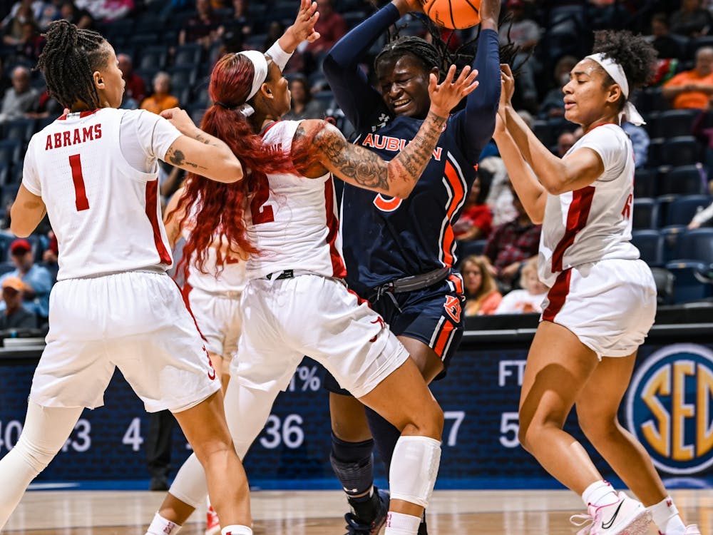 Aicha Coulibaly (5) looks for a pass during the gameAuburn v AlabamaSEC Women’s Basketball Tournament on  Wednesday, March 2, 2022 in Nashville, TN.Todd Van Emst/SEC