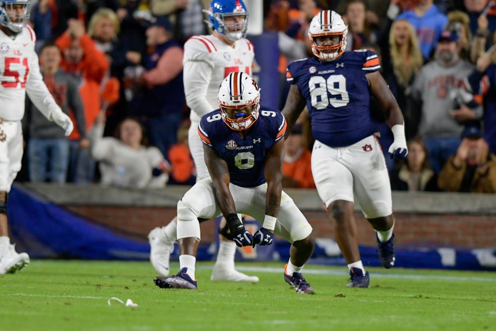 Oct 30, 2021; Auburn, AL, USA; Zakoby McClain (9) reacts after making a tackle for loss during the game between Auburn and Ole Miss at Jordan-Hare Stadium. Mandatory Credit: Todd Van Emst/AU Athletics
