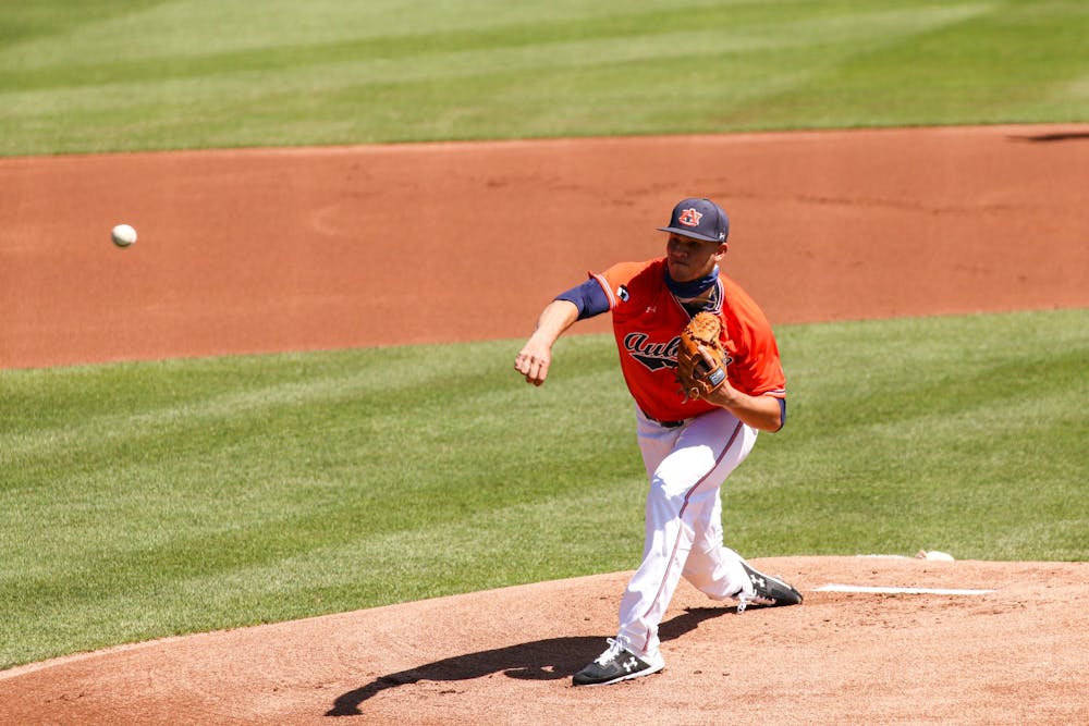 Apr 11, 2021; Auburn, AL, USA; Auburn Tigers pitcher Joseph Gonzalez (45) pitches the ball during the game during the game between Auburn and Mississippi State  at Plainsman Park. Mandatory Credit: Jacob Taylor/AU Athletics