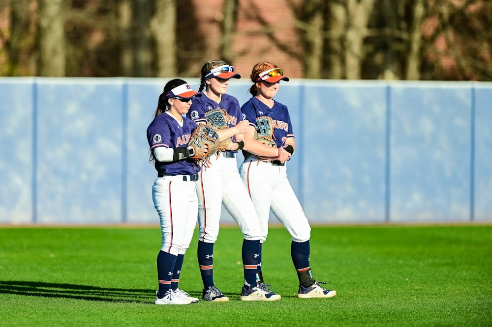 Feb 26, 2022; Auburn, Al, USA; Outfielders during the game between Auburn and Delaware State at Jane B. Moore Field.  Mandatory Credit: Grayson Belanger/AU Athletics