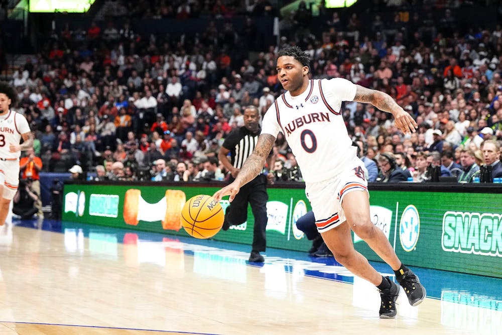 NASHVILLE, TN - MARCH 17 - Auburn's K.D. Johnson (0) during the game between the #12 Auburn Tigers and the Florida Gators at Bridgestone Arena in Nashville, TN on Sunday, March 17, 2024.

Photo by Zach Bland/Auburn Tigers