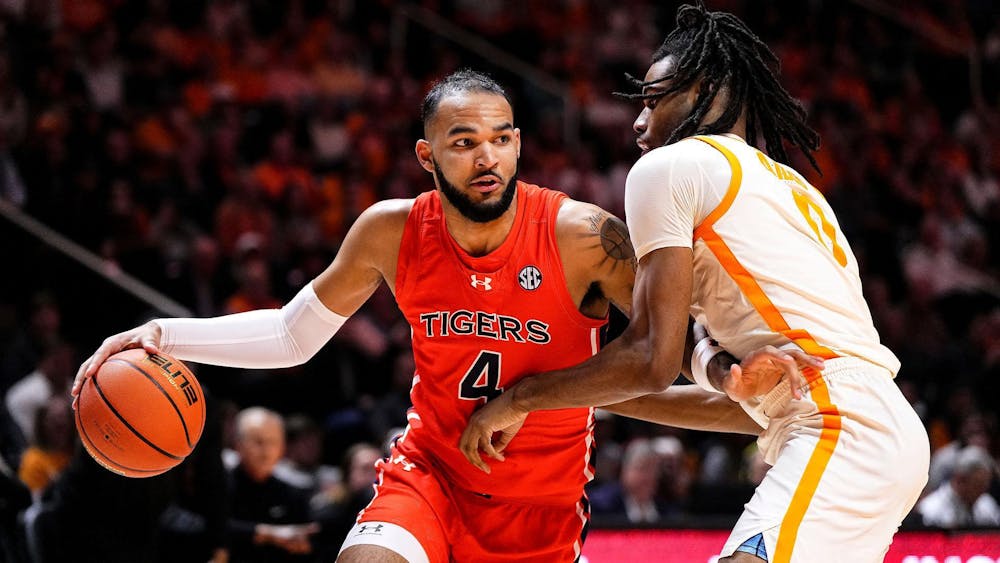 KNOXVILLE, TN - FEBRUARY 28 - Auburn's Johni Broome (4) during the game between the #11 Auburn Tigers and the #4 Tennessee Volunteers at Thompson-Boling Arena in Knoxville, TN on Wednesday, Feb. 28, 2024.

Photo by Zach Bland/Auburn Tigers (KNOXVILLE,