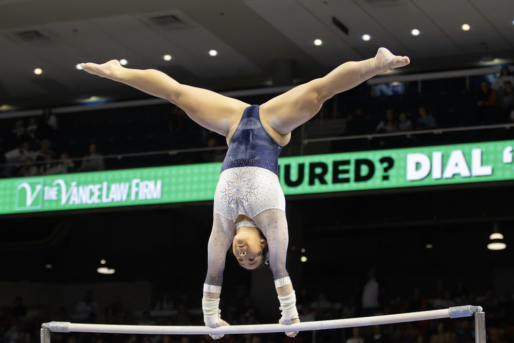 Sophia Groth performs a bar routine in Neville Arena against Arkansas on January 17th, 2025. Maggie Bowman | The Auburn Plainsman