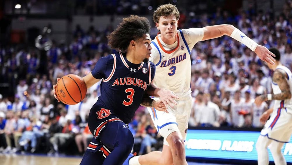 <p>GAINESVILLE, AL - FEBRUARY 10 - Auburn's Tre Donaldson (3) during the game between the #12 Auburn Tigers and the Florida Gators at Stephen O'Connell Center in Gainesville, AL on Saturday, Feb. 10, 2024. Photo by Zach Bland/Auburn TigersZach Bland/Auburn Tigers</p>