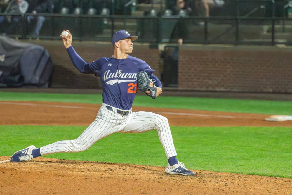 Senior right-hand pitcher Parker Carlson throws against Samford on Feb. 25, 2025. Photo by Danny Zimmermann | The Auburn Plainsman