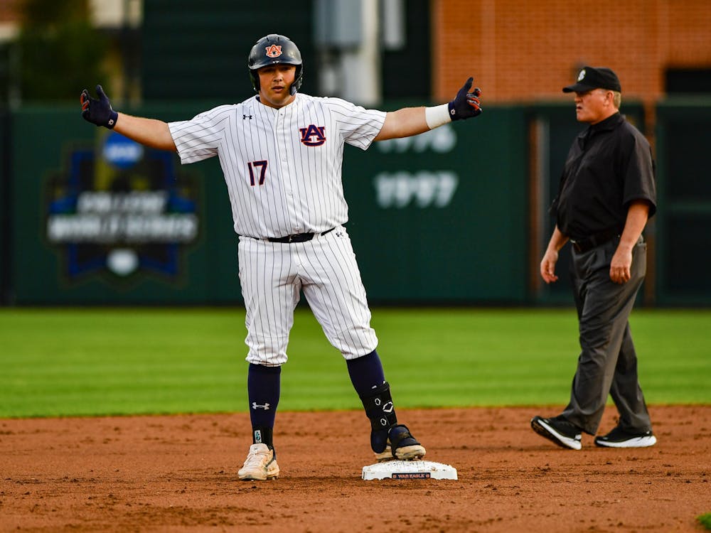 March 29, 2022; Auburn, AL, USA; Sonny DiChiara (17) reacts after getting to second during the game between Auburn and Jacksonville State at Plainsman Park. Mandatory Credit: Jacob Taylor/AU Athletics