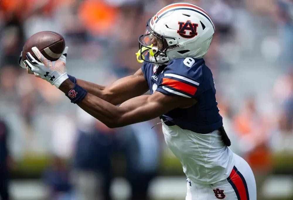 Auburn Tigers wide receiver Cam Coleman (8) catches a deep pass over the middle during the A-Day spring game at Jordan-Hare Stadium in Auburn, Ala., on Saturday, April 6, 2024.
Jake Crandall/ Advertiser