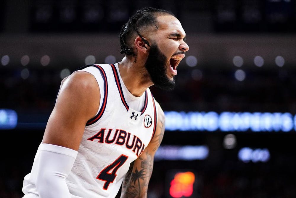 <p>AUBURN, AL - FEBRUARY 07 - Auburn's Johni Broome (4) during the game between the #12 Auburn Tigers and the #16 Alabama Crimson Tide at Neville Arena in Auburn, AL on Wednesday, Feb. 7, 2024. Photo by Zach Bland/Auburn Tigers</p>