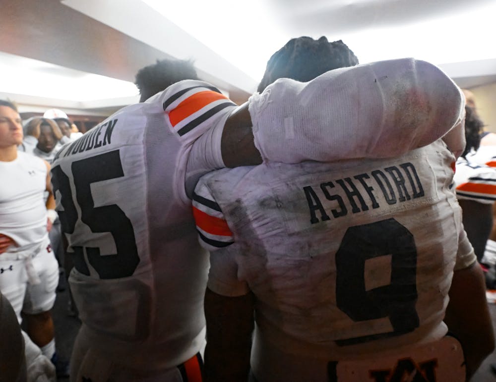 Nov 5, 2022; Starkville, MS, USA; Robby Ashford (9) and Colby Wooden (25) after the game between Auburn and Mississippi State at Davis Wade Stadium . Todd Van Emst / AU Athletics 