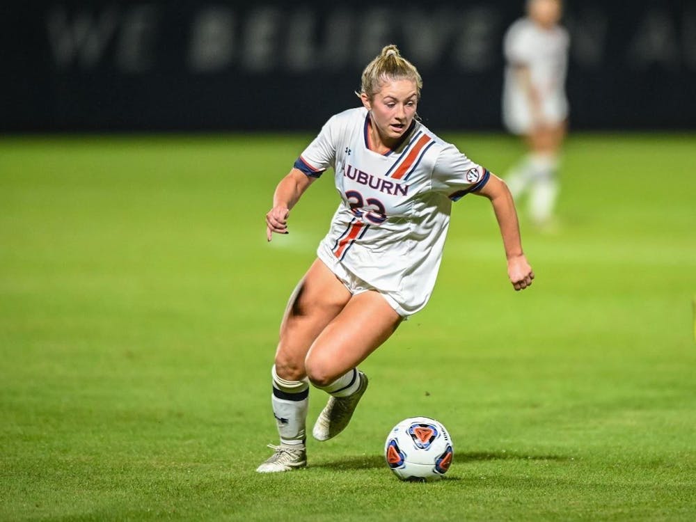 Olivia Candelino dribbles the ball in the First Round of the NCAA Tournament match against Samford at the Auburn Soccer Complex | Grayson Belanger/AU Athletics