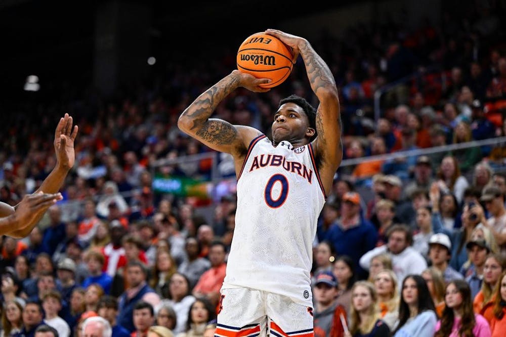 <p>AUBURN, AL - DECEMBER 22 - Auburn's K.D. Johnson (0) during the game between the Auburn Tigers and the Alabama State Hornets at Neville Arena in Auburn, AL on Friday, Dec. 22, 2023. Photo by Jamie Holt/Auburn Tigers</p>
