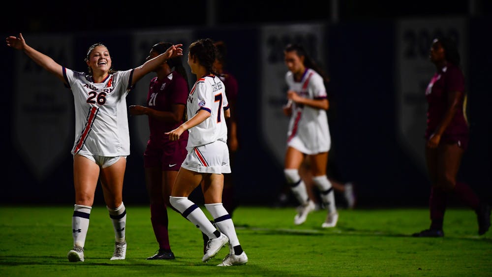 Sep 9, 2021; Auburn, AL, USA; Grace Sklopan (26) embraces Carly Thatcher (7) after she scores a goal during the game between Auburn and Alabama A&M at Auburn Soccer Complex. Mandatory Credit: Matthew Shannon/AU Athletics