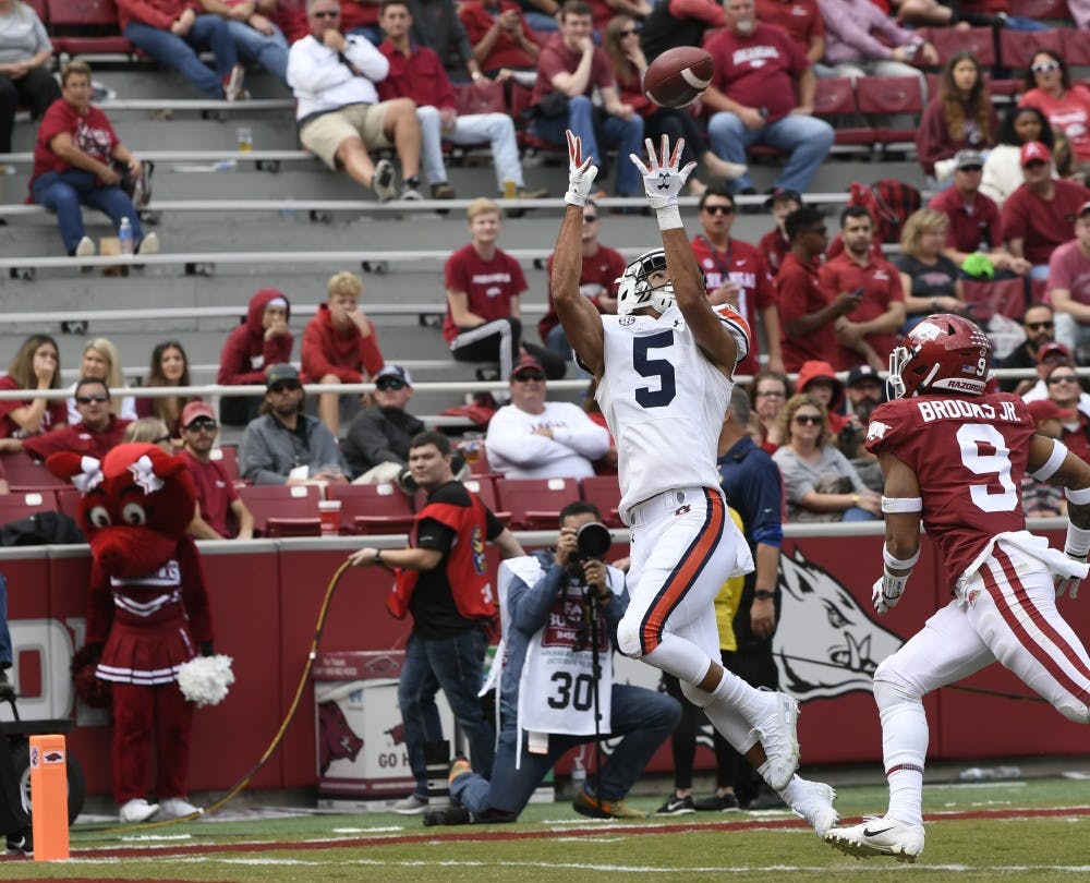 Auburn's Anthiny Schwartz scores in the second half.Auburn football vs Arkansas on Saturday, Oct. 19, 2019 in Fayetteville, AK.Todd Van Emst/AU Athletics