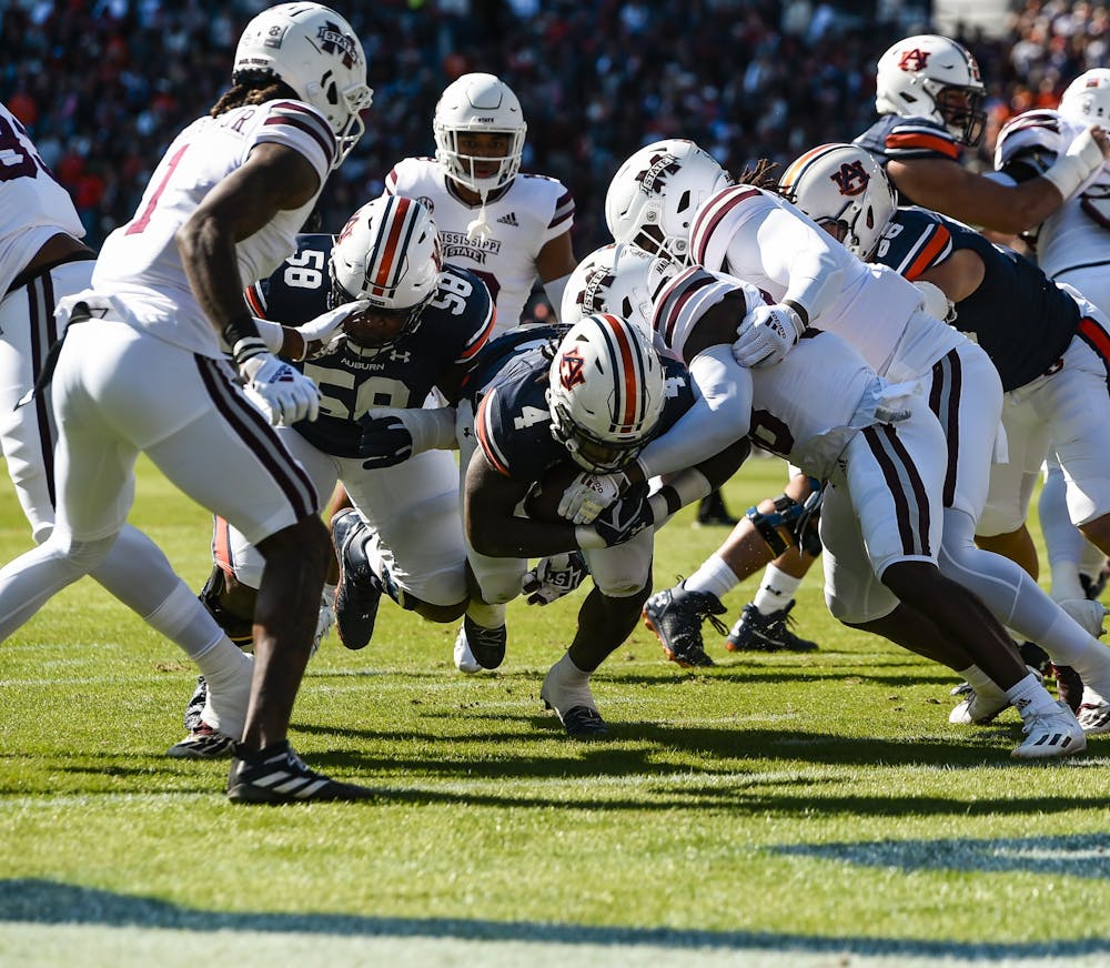 Oct 9, 2021; Auburn, AL, USA; Tank Bigsby (4) runs in for a touchdown during the game between Auburn and Mississippi State at Jordan-Hare Stadium. Mandatory Credit: Todd Van Emst/AU Athletics