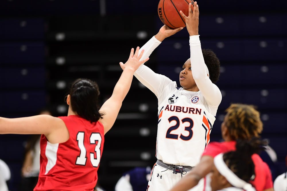 Dec 1, 2020; Auburn, AL, USA; Honesty Scott-Grayson (23) shoots during the game between Auburn and Gardner-Webb at Auburn Arena. Mandatory Credit: Shanna Lockwood/AU Athletics