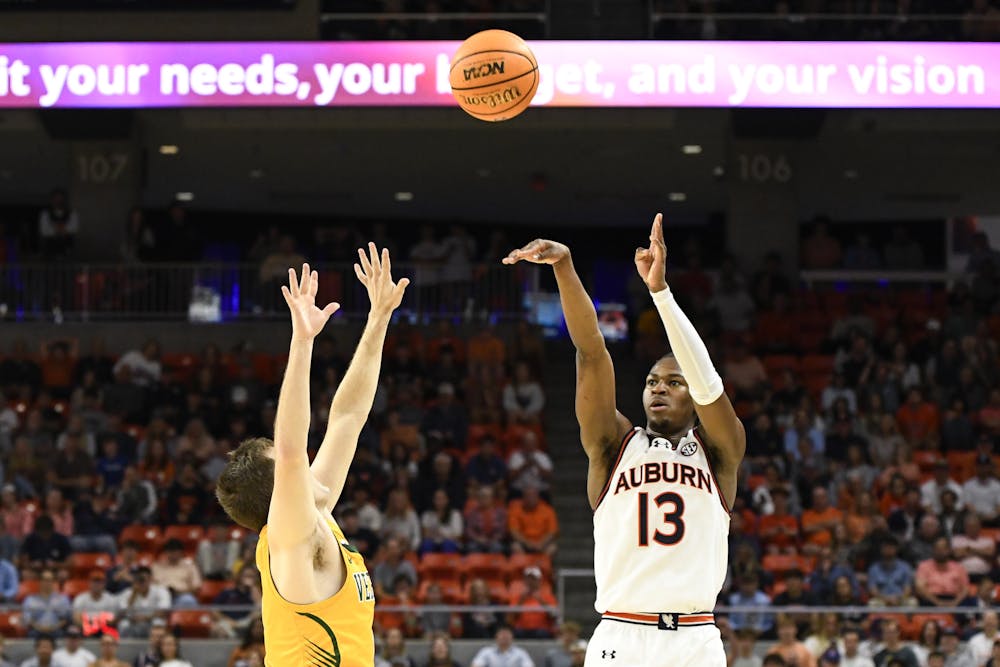 Auburn Guard Miles Kelly (13) shoots during a matchup against Vermont in Neville Arena on Nov. 6, 2024.

Elizabeth Marsh, The Auburn Plainsman