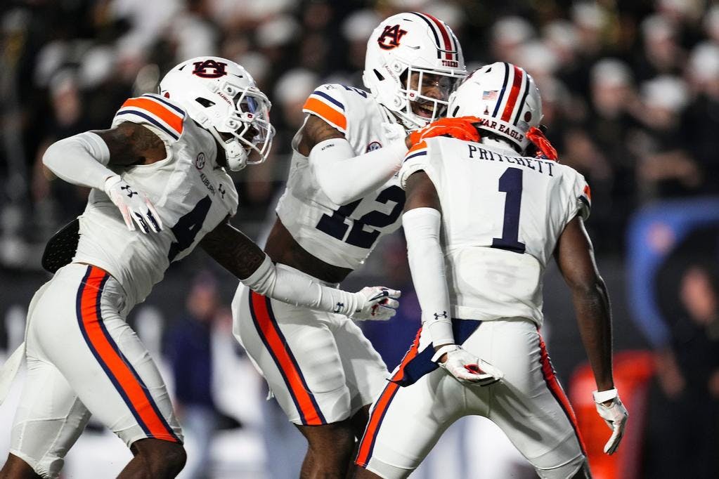 Auburn_Defensive_Back_DJ_James__4___Auburn_Defensive_Back_Caleb_Wooden__12___and_Auburn_Defensive_Back_Nehemiah_Pritchett__1__20231104_FB_vsVAN_ZB_195.jpg