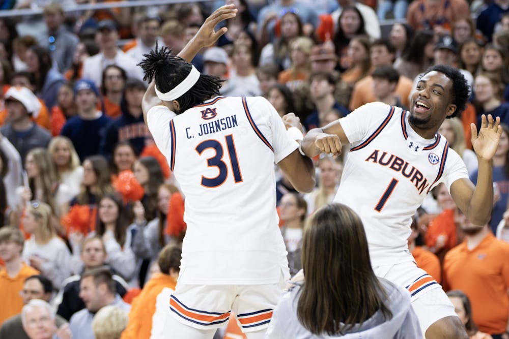 Chaney Johnson (#31) and JP Pegues (#1) have fun prior to the game against Georgia in Neville Arena on February 22nd, 2025. Photo by Maggie Bowman | The Auburn Plainsman