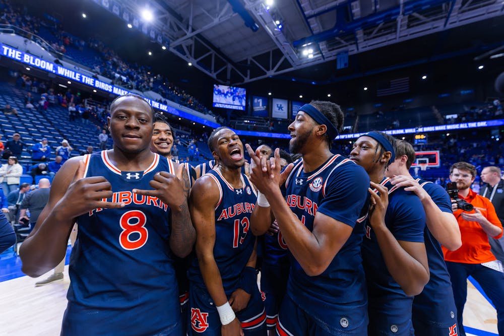 The Auburn Tigers celebrate winning a share of the 2024-2025 SEC Regular Season Championship on March 1, 2024. Photo by Luca Flores | The Auburn Plainsman
