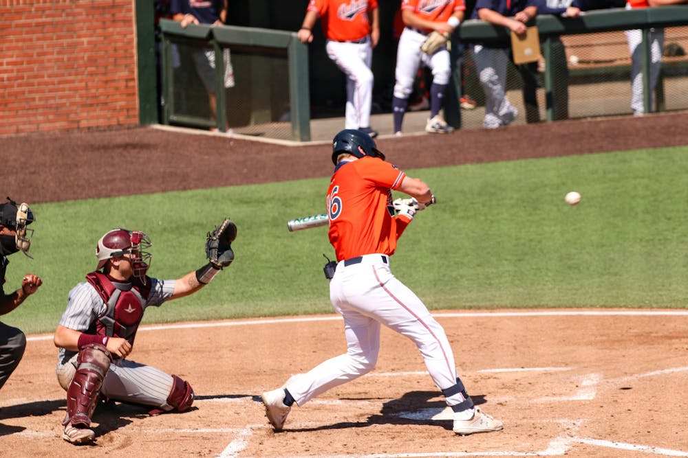 Apr 11, 2021; Auburn, AL, USA; Auburn Tigers pitcher/infielder Cam Hill (16) hits the ball during the game between Auburn and Mississippi State  at Plainsman Park. Mandatory Credit: Jacob Taylor/AU Athletics