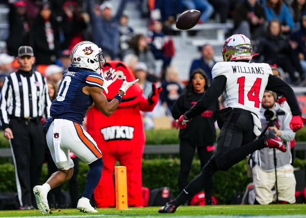 Nov 19, 2022; Auburn, Al, USA; Koy Moore (0) catches a pass from Jarquez Hunter (27) during the game between Auburn and Western Kentucky at Jordan-Hare Stadium. Zach Bland/AU Athletics