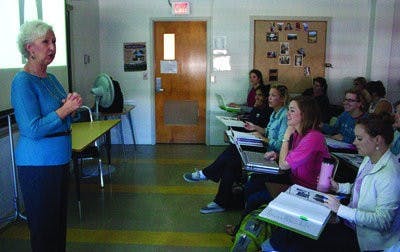 Pamela Ulrich lectures on 18th-century dress during a History of Costume class in Spidle Hall Monday morning. The class focuses on how costume has changed over time, starting in 1910. (Emily Adams / Photo Editor)