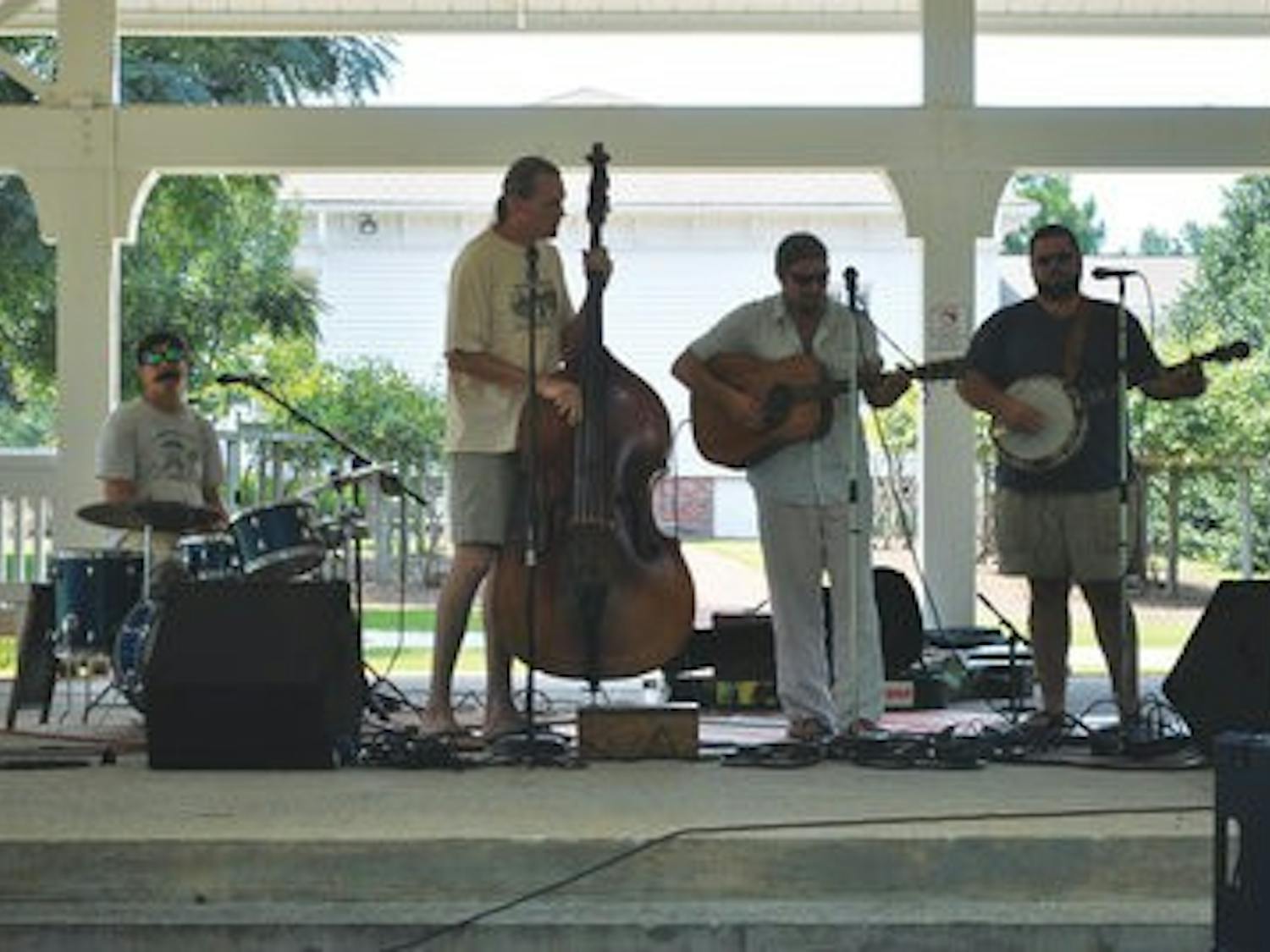 The Dooley's Blue Revue performed at the third annual "No Excuse" music festival on Saturday, August 21 in Kiesel Park. (Elaine Busby / ASSISTANT PHOTO EDITOR)