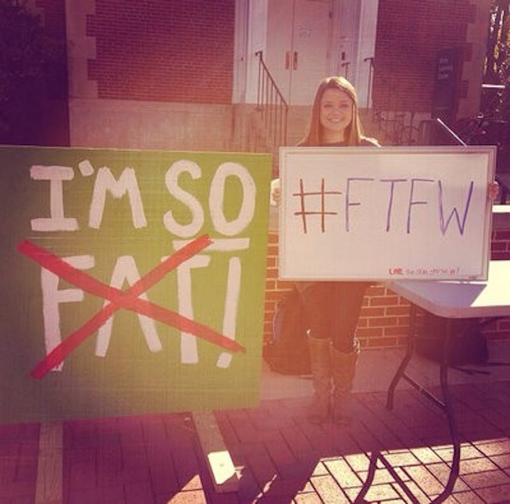 Sarah Foster, V1 in veterinary medicine, promotes positive body image on the Haley concourse.
