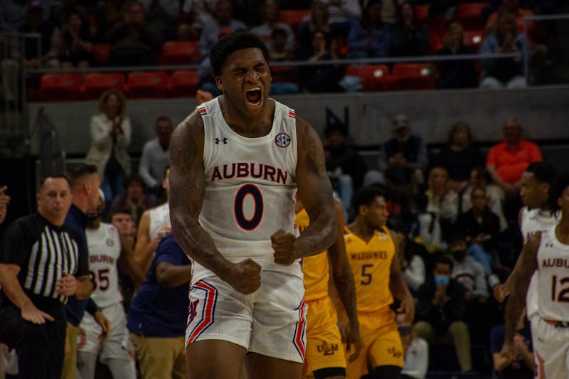 Nov. 12, 2021; K.D. Johnson shows excitement during a game against Louisiana-Monroe from the Auburn Arena in Auburn, Ala.