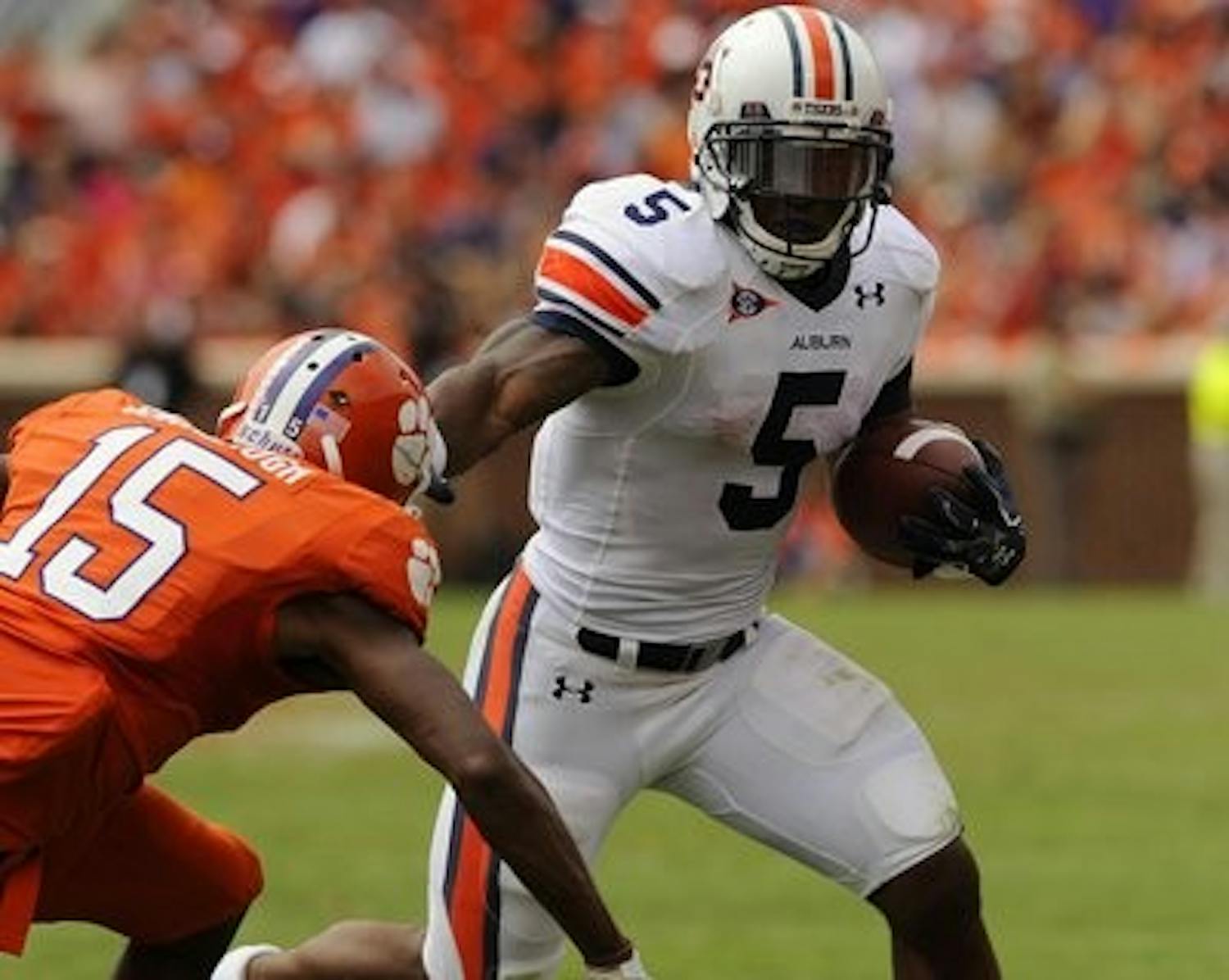Running back Michael Dyer sprints from an opposing Tiger at Saturday's game. (Todd Van Emst / AUBURN MEDIA RELATIONS)