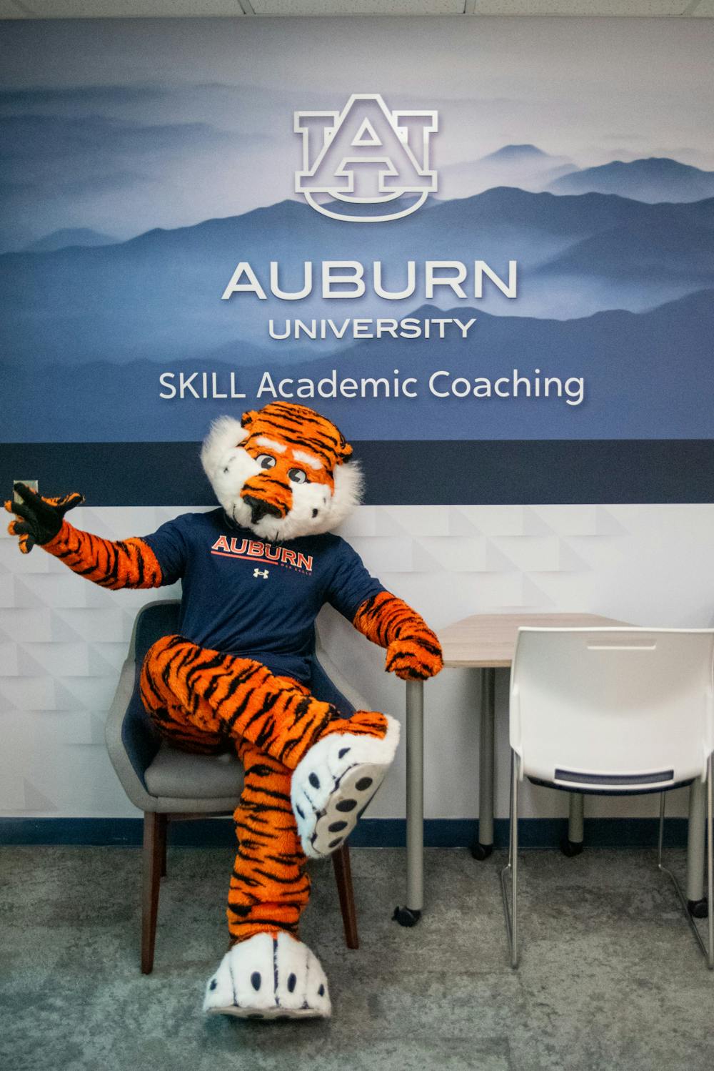 <p>Aubie poses in SKILL's lounge located in the 0300 quadrant of the Haley Center.</p>