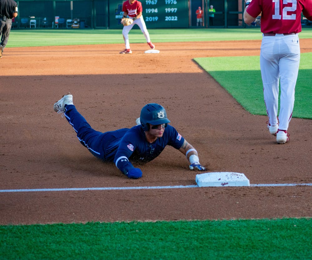 Cooper Weiss sliding into third base in the game against Alabama on May 16, 2024 