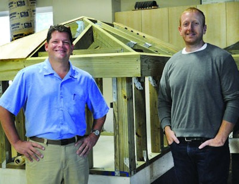 Professors Paul Holley (left) and Joshua Emig started the joint graduate program linking the schools of building science and architecture. (Christen Harned / ASSISTANT PHOTO EDITOR)