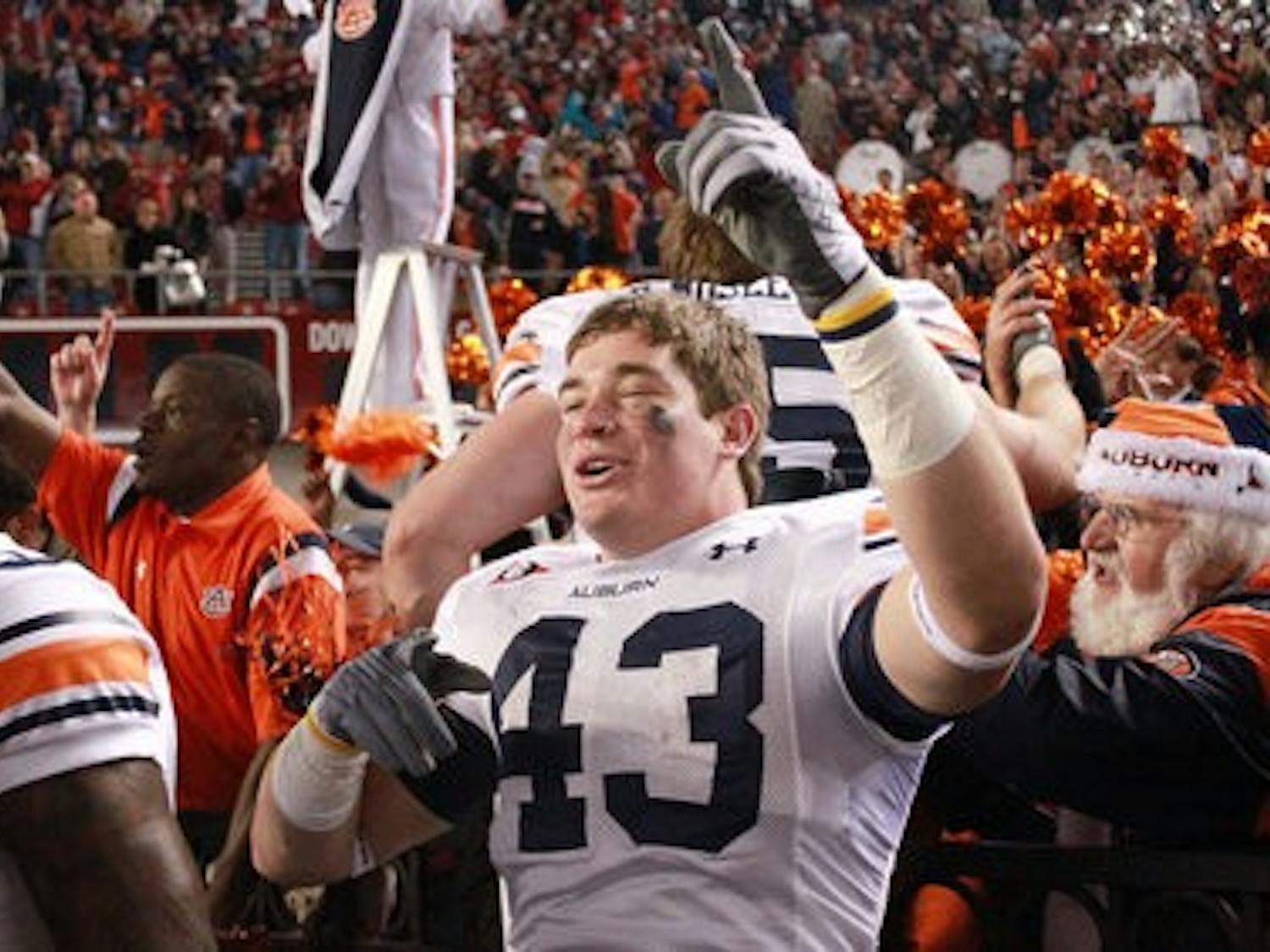 Philip Lutzenkirchen celebrates the win. (Emily Adams/PHOTO EDITOR)