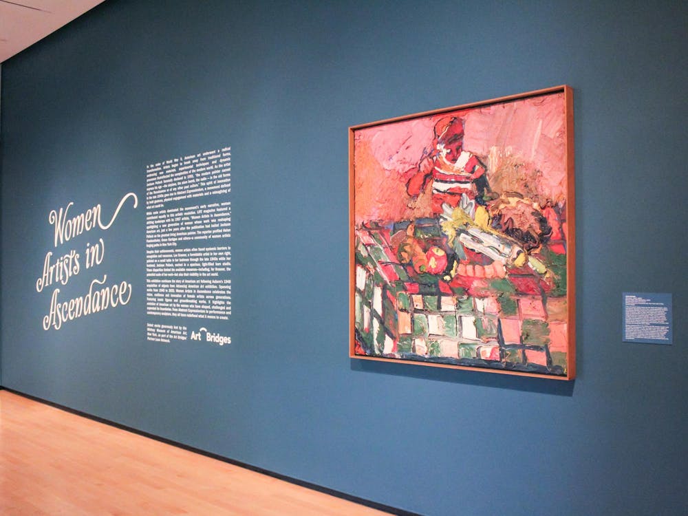 <p>The Jule Museum displays a painting by Joan Brown titled "Noel at Table with Vegetables" in their Women Artists in Ascendance exhibit on Nov. 14, 2025.</p>