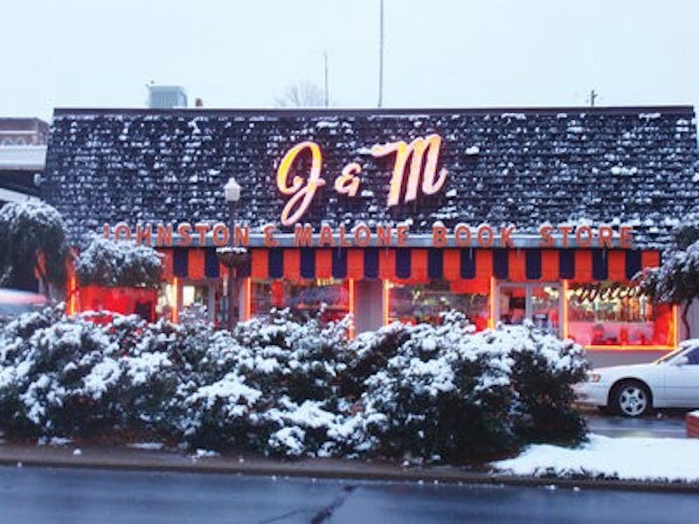 J&M bookstore gets a rare covering of snow on its storefront during the 2010 snow day. (Christen Harned / assistant photo editor)