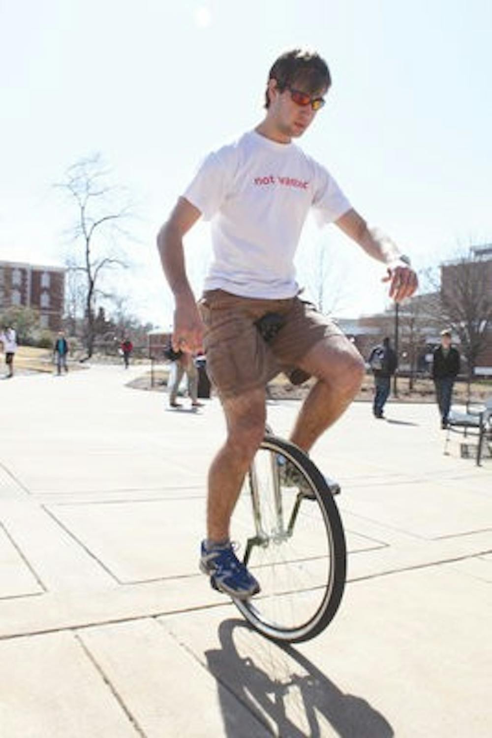 Kevin Tonn's interest in unicycling began after a friend of his opened his eyes to the world of carnival talents. Jared Waters / ASSISTANT PHOTO EDITOR